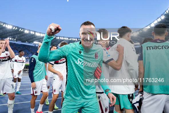 Lukasz Skorupski of Bologna FC celebrates the victory at the end of the Serie A Enilive match between AS Roma and Bologna FC at Stadio Olimp...