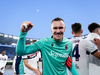 Lukasz Skorupski of Bologna FC celebrates the victory at the end of the Serie A Enilive match between AS Roma and Bologna FC at Stadio Olimp...