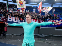 Lukasz Skorupski of Bologna FC celebrates the victory at the end of the Serie A Enilive match between AS Roma and Bologna FC at Stadio Olimp...