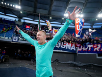 Lukasz Skorupski of Bologna FC celebrates the victory at the end of the Serie A Enilive match between AS Roma and Bologna FC at Stadio Olimp...