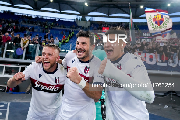 Jesper Karlsson of Bologna FC celebrates the victory with Riccardo Orsolini and Santiago Castro at the end of  the Serie A Enilive match bet...