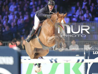 Gregory Cottard rides Gammelgaards Carola during the CSI5*-W Longines FEI Jumping World Cup 2024 Grand Prix presented by KASK at Pala Fimaut...