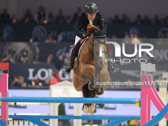 Mark McAuley rides Django Ste Hermelle during the CSI5*-W Longines FEI Jumping World Cup 2024 Grand Prix presented by KASK, at Pala Fimauto...