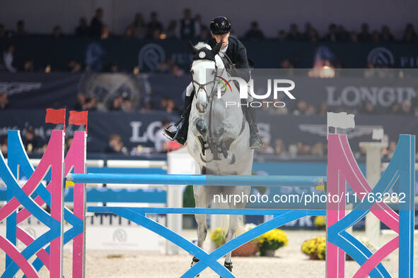 Kevin Jochems rides Camilla Van de Helle during the CSI5*-W Longines FEI Jumping World Cup 2024 Grand Prix presented by KASK at Pala Fimauto...