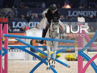 Lara Tryba rides Memphis Z during the CSI5*-W Longines FEI Jumping World Cup 2024 Grand Prix presented by KASK, at Pala Fimauto in Verona, I...