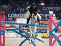 Lara Tryba rides Memphis Z during the CSI5*-W Longines FEI Jumping World Cup 2024 Grand Prix presented by KASK, at Pala Fimauto in Verona, I...