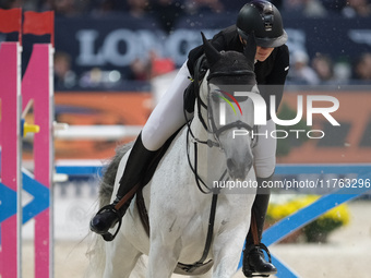 Lara Tryba rides Memphis Z during the CSI5*-W Longines FEI Jumping World Cup 2024 Grand Prix presented by KASK, at Pala Fimauto in Verona, I...