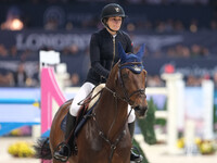 Jeanne Sadran rides Dexter de Kerglenn during the CSI5*-W Longines FEI Jumping World Cup 2024 Grand Prix presented by KASK at Pala Fimauto i...