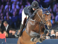 Jeanne Sadran rides Dexter de Kerglenn during the CSI5*-W Longines FEI Jumping World Cup 2024 Grand Prix presented by KASK at Pala Fimauto i...