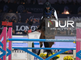 Jeanne Sadran rides Dexter de Kerglenn during the CSI5*-W Longines FEI Jumping World Cup 2024 Grand Prix presented by KASK, at Pala Fimauto...