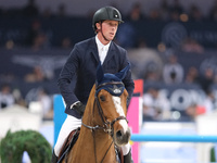 Ben Maher rides Point Break during the CSI5*-W Longines FEI Jumping World Cup 2024 Grand Prix presented by KASK, at Pala Fimauto in Verona,...