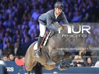 Steve Guerdat rides Venard de Cerisy during the CSI5*-W Longines FEI Jumping World Cup 2024 Grand Prix presented by KASK, at Pala Fimauto in...