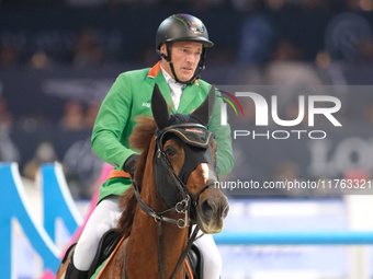 Gerfried Puck rides Equitron Naxcel V during the CSI5*-W Longines FEI Jumping World Cup 2024 Grand Prix presented by KASK at Pala Fimauto in...