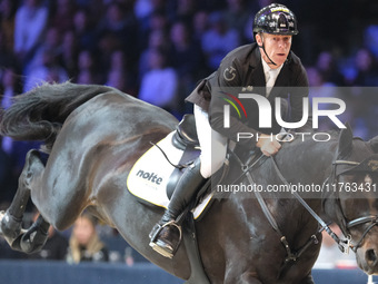 Marcus Ehning rides Coolio 42 during the CSI5*-W Longines FEI Jumping World Cup 2024 Grand Prix presented by KASK, at Pala Fimauto in Verona...