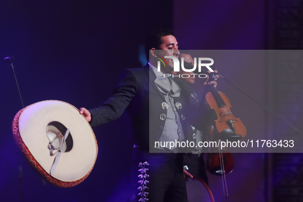 Members of Mariachi de America de Jesus Ramirez Hijar participate in the First World Mariachi Congress at the Teatro Esperanza Iris in Mexic...