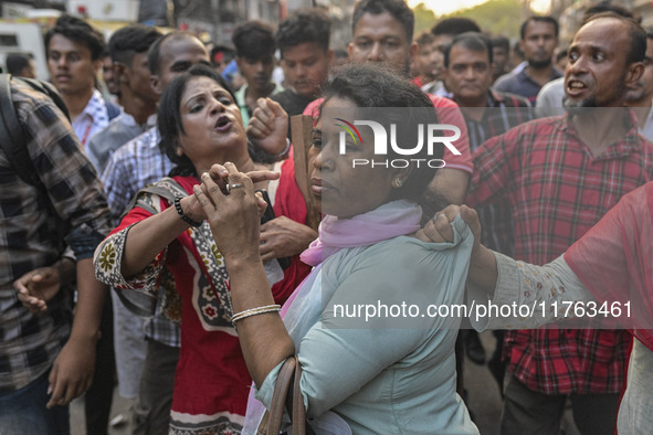 Bangladesh Nationalist Party women activists attack an Awami League woman supporter in Dhaka, Bangladesh, on November 10, 2024. 