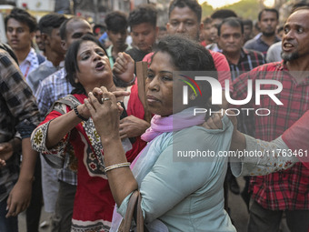 Bangladesh Nationalist Party women activists attack an Awami League woman supporter in Dhaka, Bangladesh, on November 10, 2024. (