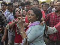 Bangladesh Nationalist Party women activists attack an Awami League woman supporter in Dhaka, Bangladesh, on November 10, 2024. (