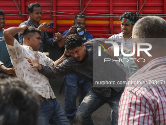 Students from anti-discrimination movements attack an Awami League supporter in Dhaka, Bangladesh, on November 10, 2024. (