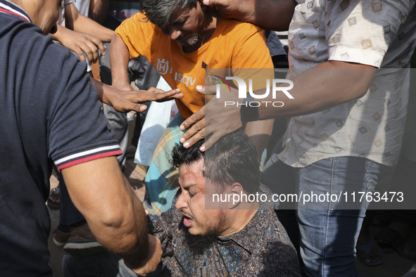 Students from anti-discrimination movements attack an Awami League supporter in Dhaka, Bangladesh, on November 10, 2024. 