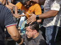 Students from anti-discrimination movements attack an Awami League supporter in Dhaka, Bangladesh, on November 10, 2024. (