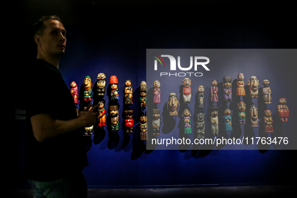 Visitors watch exhibitions in HeydarAliyev Centre in Baku, the capital of Azerbaijan on November 10, 2024. 