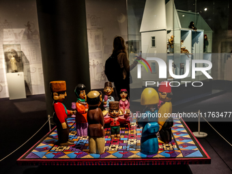 Visitors watch exhibitions in HeydarAliyev Centre in Baku, the capital of Azerbaijan on November 10, 2024. (