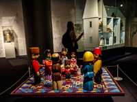 Visitors watch exhibitions in HeydarAliyev Centre in Baku, the capital of Azerbaijan on November 10, 2024. (