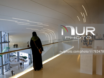 Visitors watch exhibitions in HeydarAliyev Centre in Baku, the capital of Azerbaijan on November 10, 2024. (