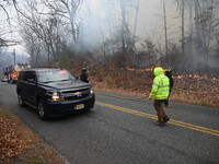 A wildfire impacts several forests in the area on Sunday morning in New York State as it is announced that a New York State parks employee w...