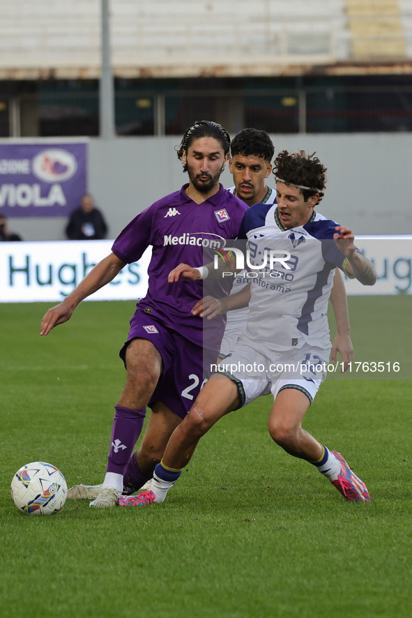 Yacine Adli of ACF Fiorentina and Domagoj Bradaric of Hellas Verona FC ,battle for the ball during the Italian Serie A football match betwee...