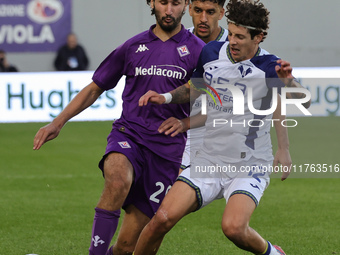 Yacine Adli of ACF Fiorentina and Domagoj Bradaric of Hellas Verona FC ,battle for the ball during the Italian Serie A football match betwee...