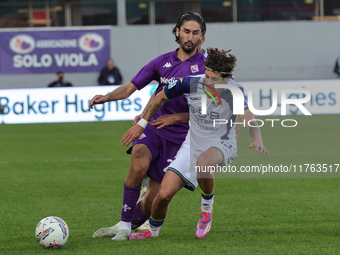 Yacine Adli of ACF Fiorentina and Domagoj Bradaric of Hellas Verona FC ,battle for the ball during the Italian Serie A football match betwee...