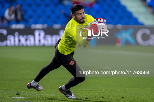 Paulo Gazzaniga of Girona FC warms up during the La Liga EA Sports 2024/25 football match between Getafe CF and Girona FC at Estadio Coliseu...