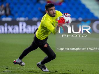 Paulo Gazzaniga of Girona FC warms up during the La Liga EA Sports 2024/25 football match between Getafe CF and Girona FC at Estadio Coliseu...