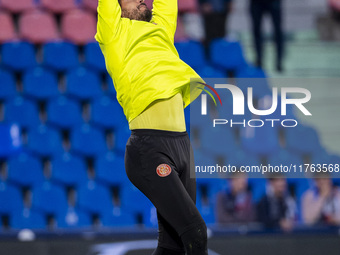 Paulo Gazzaniga of Girona FC warms up during the La Liga EA Sports 2024/25 football match between Getafe CF and Girona FC at Estadio Coliseu...