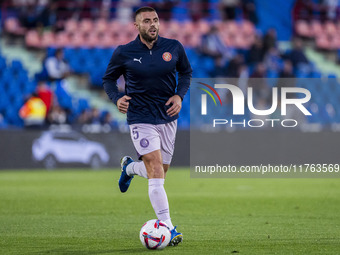 David Lopez of Girona FC warms up during the La Liga EA Sports 2024/25 football match between Getafe CF and Girona FC at Estadio Coliseum in...