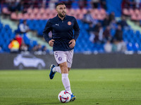 David Lopez of Girona FC warms up during the La Liga EA Sports 2024/25 football match between Getafe CF and Girona FC at Estadio Coliseum in...