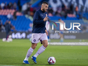 David Lopez of Girona FC warms up during the La Liga EA Sports 2024/25 football match between Getafe CF and Girona FC at Estadio Coliseum in...