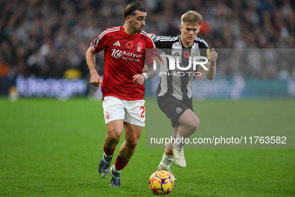 Jota Silva of Nottingham Forest is under pressure from Lewis Hall of Newcastle United during the Premier League match between Nottingham For...