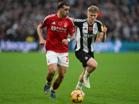 Jota Silva of Nottingham Forest is under pressure from Lewis Hall of Newcastle United during the Premier League match between Nottingham For...