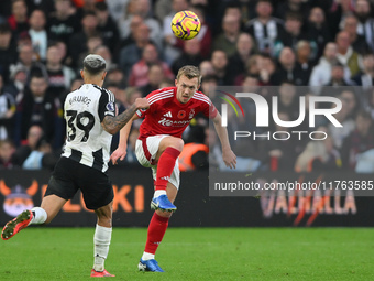 James Ward-Prowse of Nottingham Forest plays the ball forward under pressure from Bruno Guimaraes of Newcastle United during the Premier Lea...