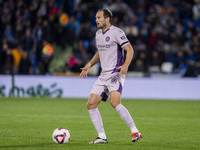 Daley Blind of Girona FC is in action with the ball during the La Liga EA Sports 2024/25 football match between Getafe CF and Girona FC at E...