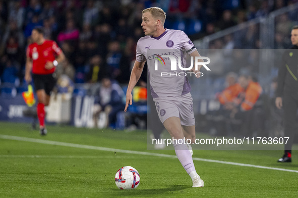 Donny van de Beek of Girona FC is in action with the ball during the La Liga EA Sports 2024/25 football match between Getafe CF and Girona F...