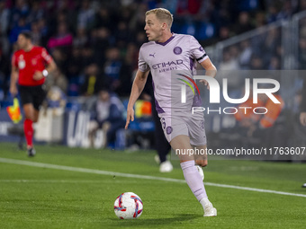 Donny van de Beek of Girona FC is in action with the ball during the La Liga EA Sports 2024/25 football match between Getafe CF and Girona F...