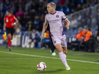 Donny van de Beek of Girona FC is in action with the ball during the La Liga EA Sports 2024/25 football match between Getafe CF and Girona F...