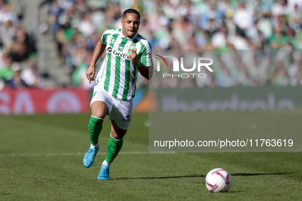 Vitor Roque of Real Betis runs with the ball during the La Liga EA Sport match between Real Betis and RC Celta de Vigo at Benito Villamarin...