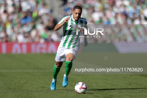 Vitor Roque of Real Betis runs with the ball during the La Liga EA Sport match between Real Betis and RC Celta de Vigo at Benito Villamarin...