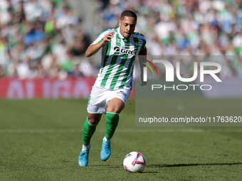 Vitor Roque of Real Betis runs with the ball during the La Liga EA Sport match between Real Betis and RC Celta de Vigo at Benito Villamarin...