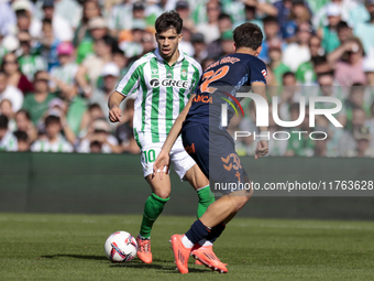 Ez Abde of Real Betis runs with the ball during the La Liga EA Sport match between Real Betis and RC Celta de Vigo at Benito Villamarin in S...